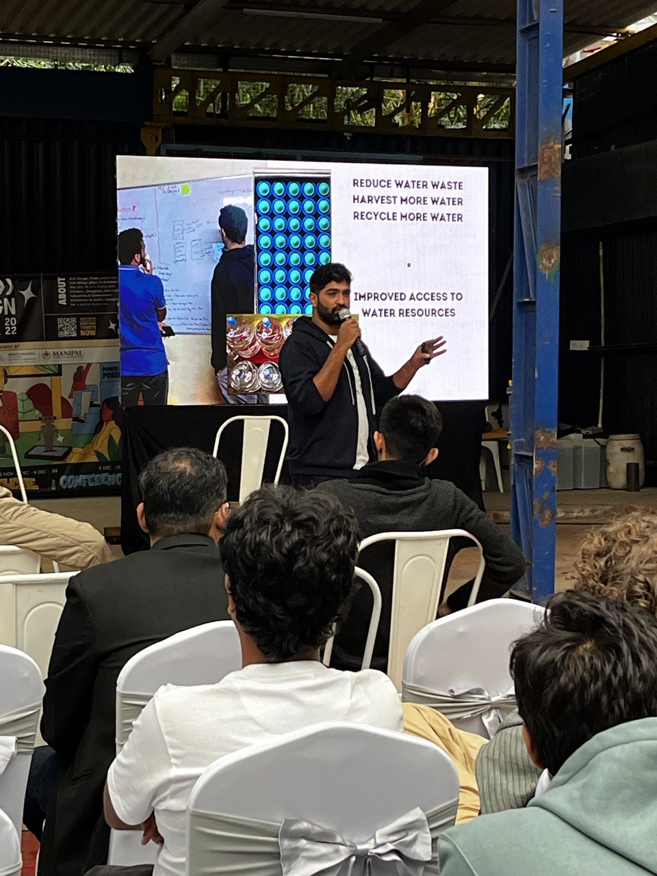 Irthu presenting a community water project in Chikkamagaluru